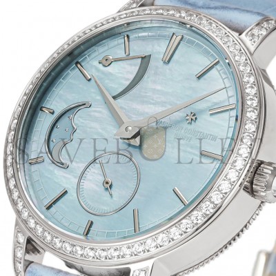 VACHERON CONSTANTIN TRADITIONELLE MOON PHASE BLUE MOP DIAL WITH DIAMOND BEZEL IN WHITE GOLD ON BLUE LEATHER STRAP WATCH 83570/000G-9916